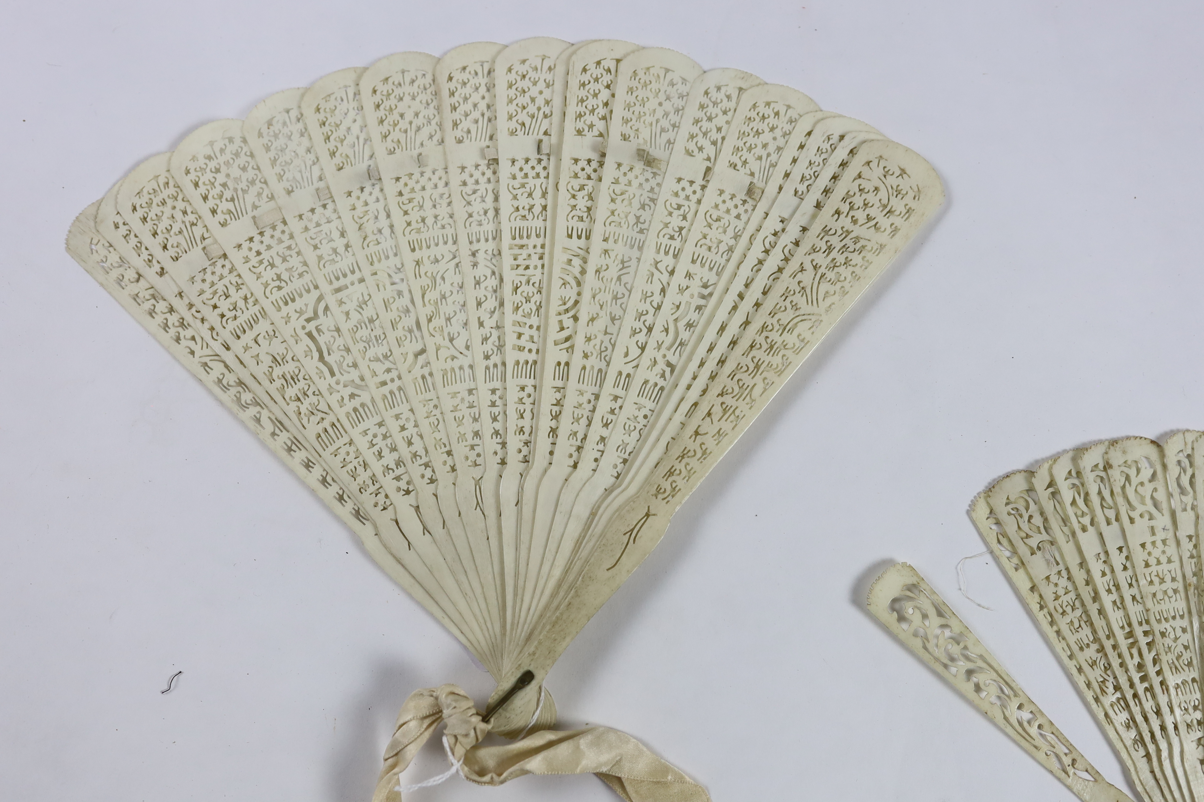 Three late 19th century 19th / early 20th century Chinese bone brisé fans